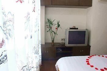Yangguang Xingzuo Apartment Hotel Chongqing Exteriör bild