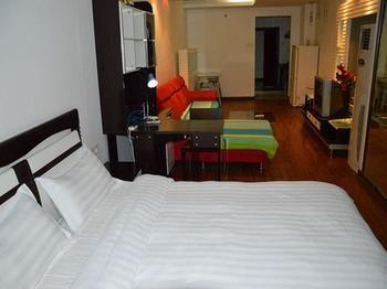 Yangguang Xingzuo Apartment Hotel Chongqing Exteriör bild