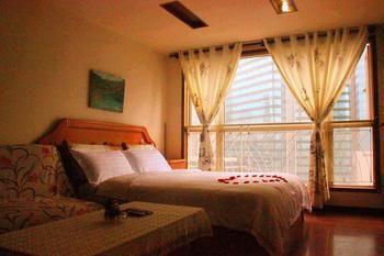 Yangguang Xingzuo Apartment Hotel Chongqing Exteriör bild